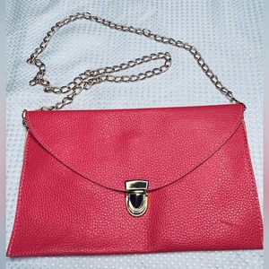 Faux Leather Coral Envelope Clutch with Removable Gold Chain Strap.